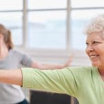 cancer support groups doing physical exercise with patients