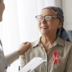 doctor answering a patient's questions about cancer